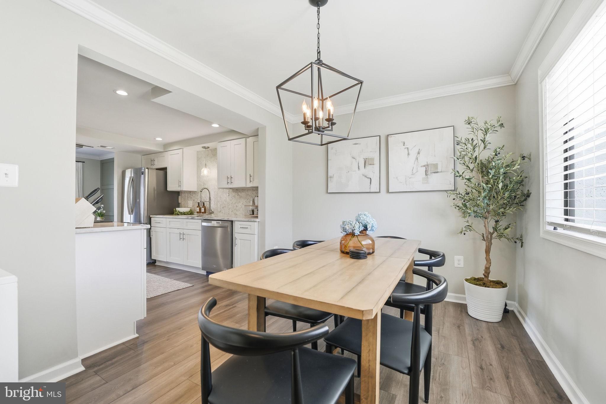 181 North Cottage Road Sterling, VA 20164 - Photo 13 of 41 a view of a dining room with furniture and wooden floor