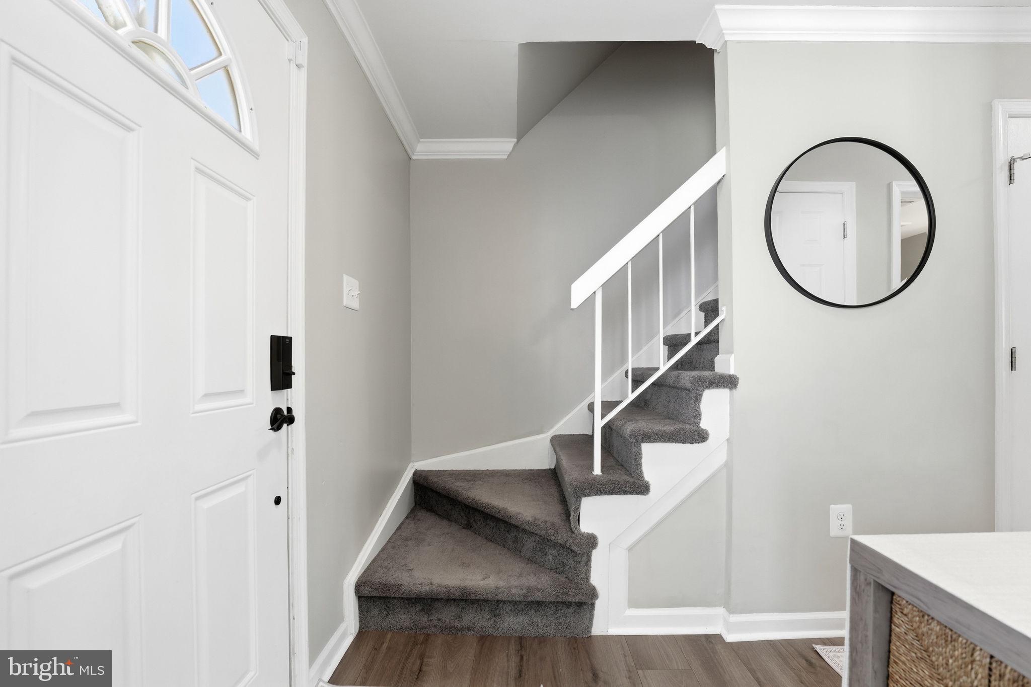 181 North Cottage Road Sterling, VA 20164 - Photo 17 of 41 a view of entryway with wooden floor and stair