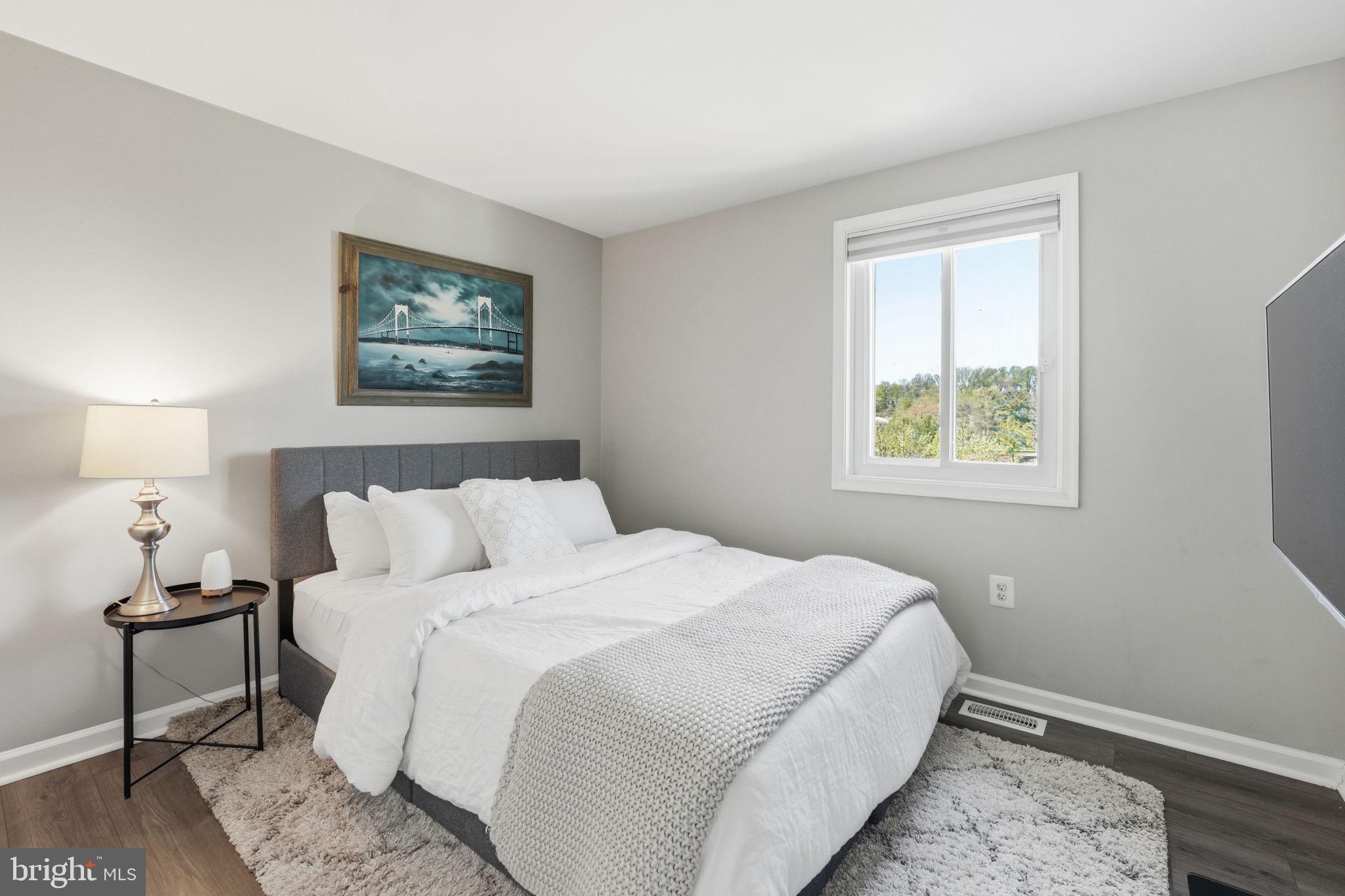181 North Cottage Road Sterling, VA 20164 - Photo 24 of 41 a bedroom with a bed and a window