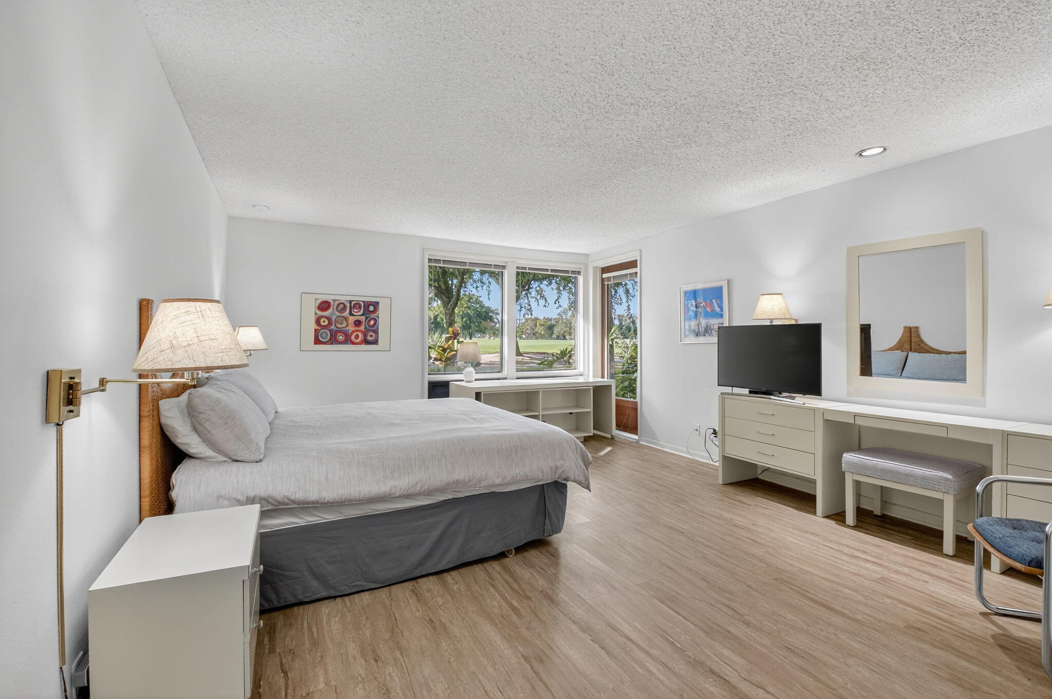 20249 Boca W Drive, Unit 2605 Boca Raton, FL 33434 - Photo 17 of 85 a bed room with a bed and a chair