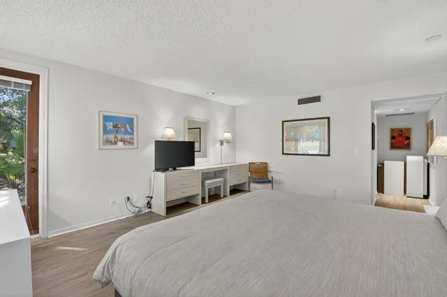 a bathroom with a tub and a window