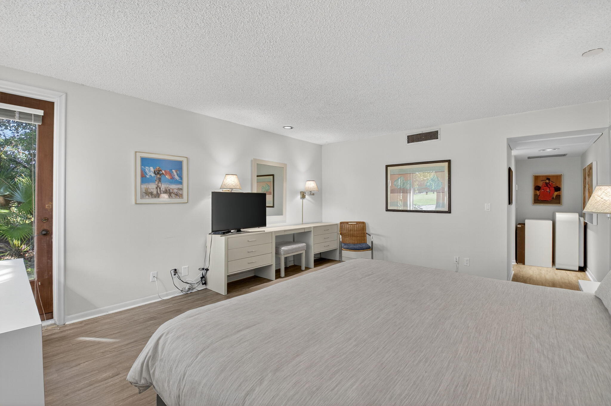 20249 Boca W Drive, Unit 2605 Boca Raton, FL 33434 - Photo 19 of 85 a bedroom with a bed and a flat screen tv