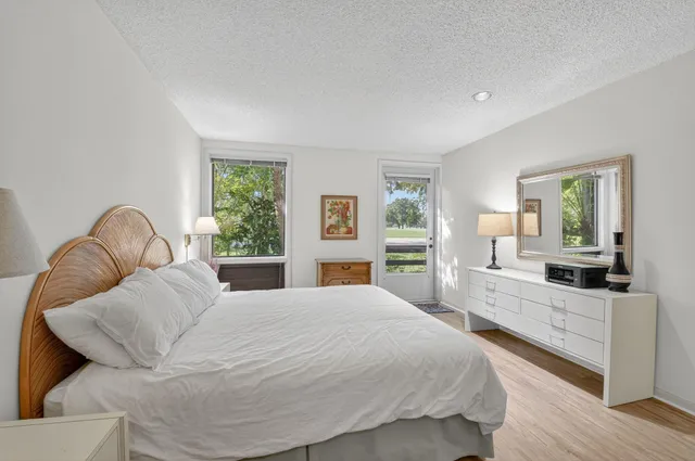 a view of a two chairs in the patio