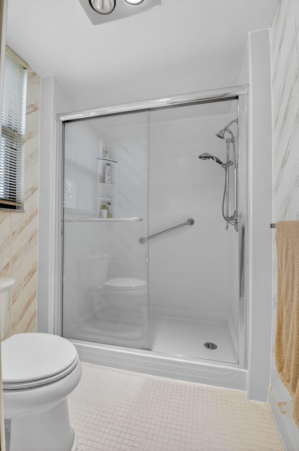 20249 Boca W Drive, Unit 2605 Boca Raton, FL 33434 - Photo 28 of 85 a bathroom with a shower and a toilet