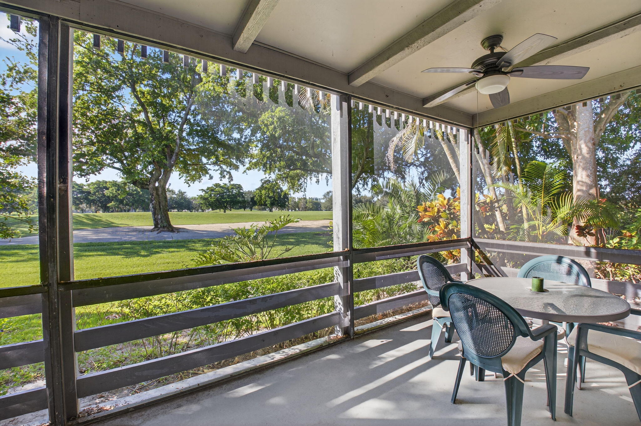 20249 Boca W Drive, Unit 2605 Boca Raton, FL 33434 - Photo 29 of 85 a view of a two chairs in the patio