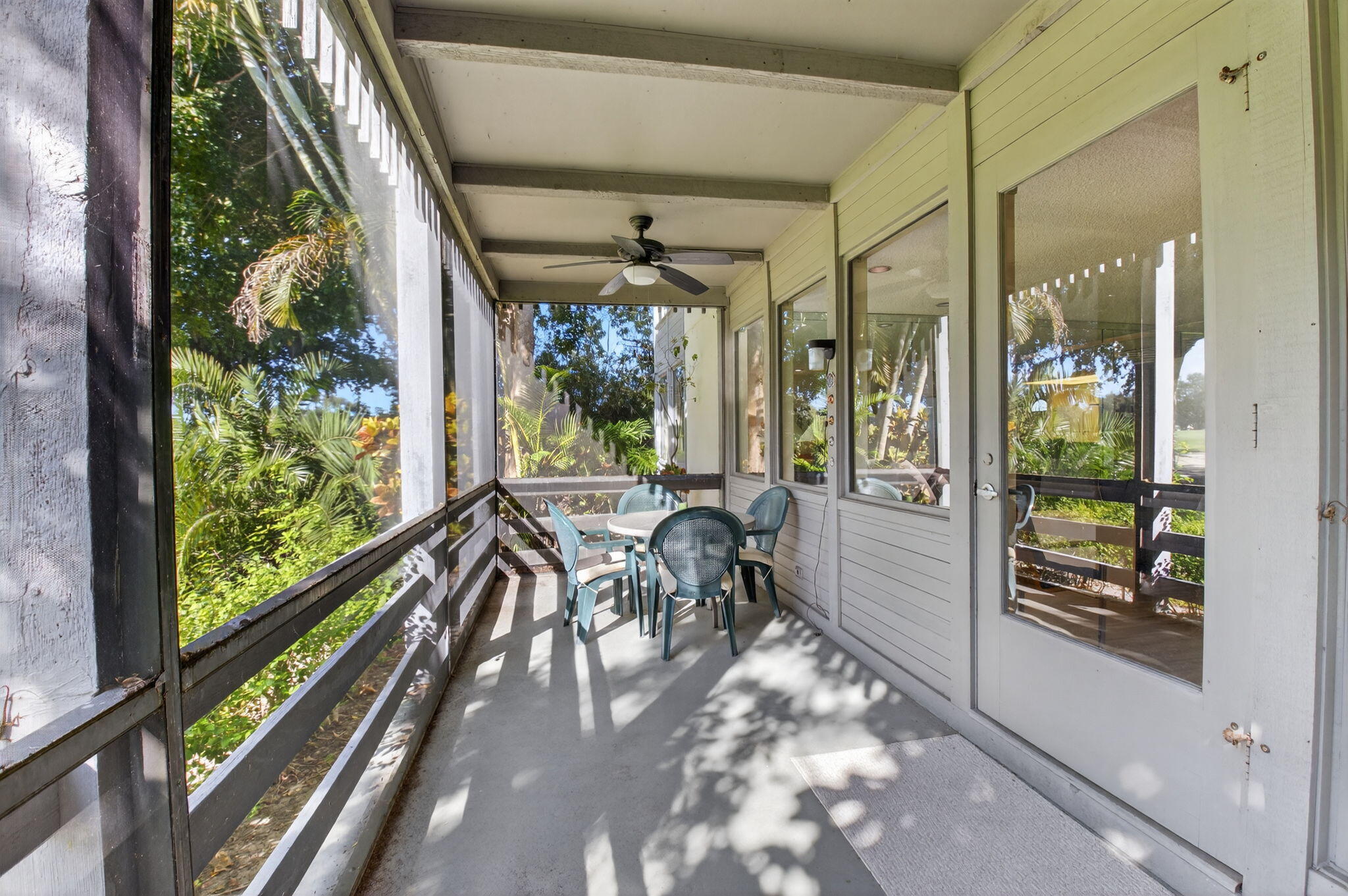 20249 Boca W Drive, Unit 2605 Boca Raton, FL 33434 - Photo 31 of 85 a view of a porch with chairs and couches in the balcony