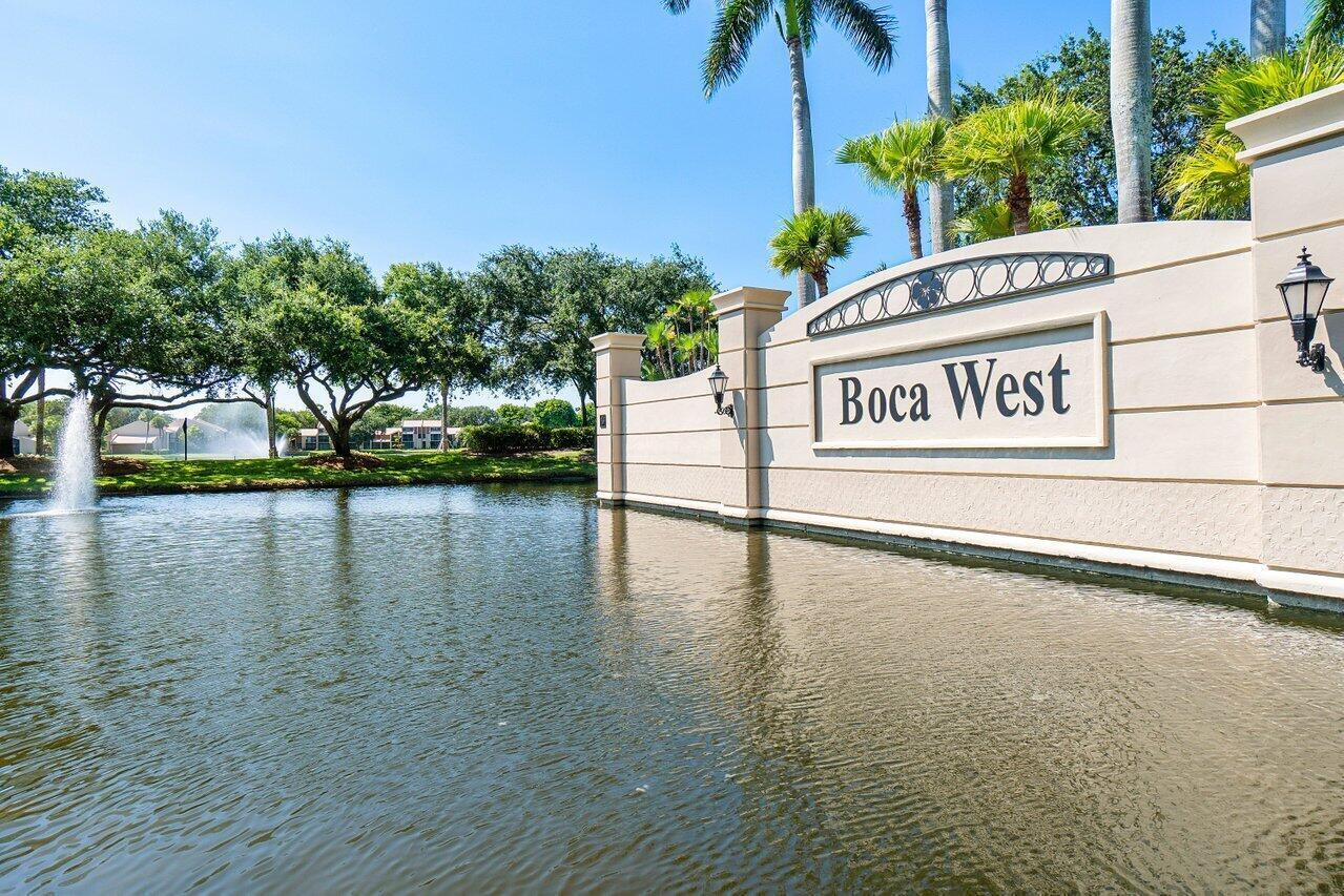 20249 Boca W Drive, Unit 2605 Boca Raton, FL 33434 - Photo 36 of 85 a view of a street with a building in the background