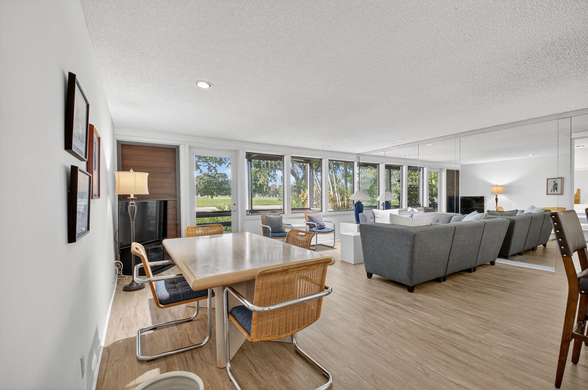 20249 Boca W Drive, Unit 2605 Boca Raton, FL 33434 - Photo 8 of 85 a living room with furniture and a large window