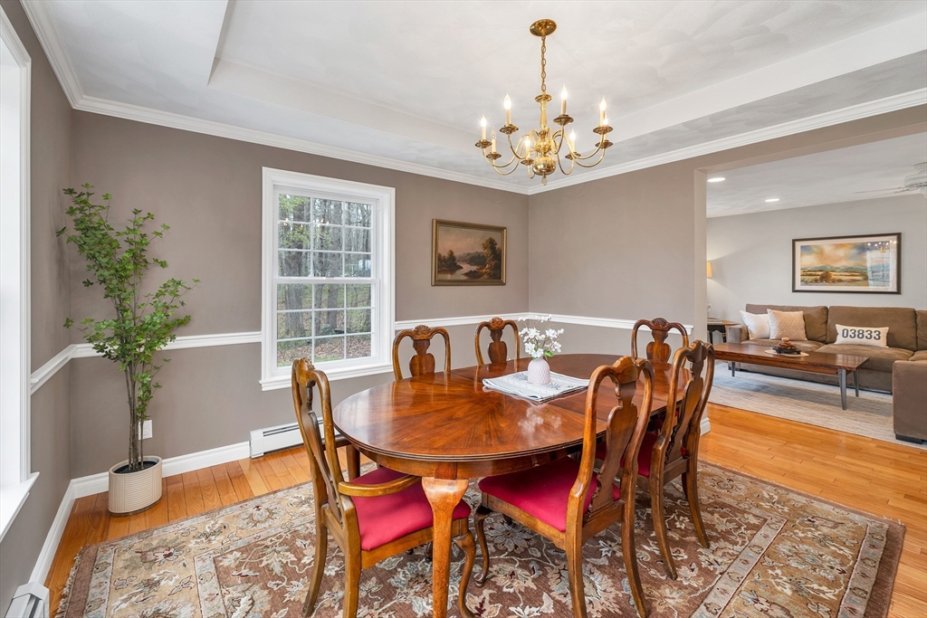 9 Juniper Ridge Road Exeter, NH 03833 - Photo 17 of 41 a view of a dining room with furniture