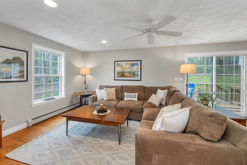 9 Juniper Ridge Road Exeter, NH 03833 - Photo 18 of 41 a living room with furniture and a window