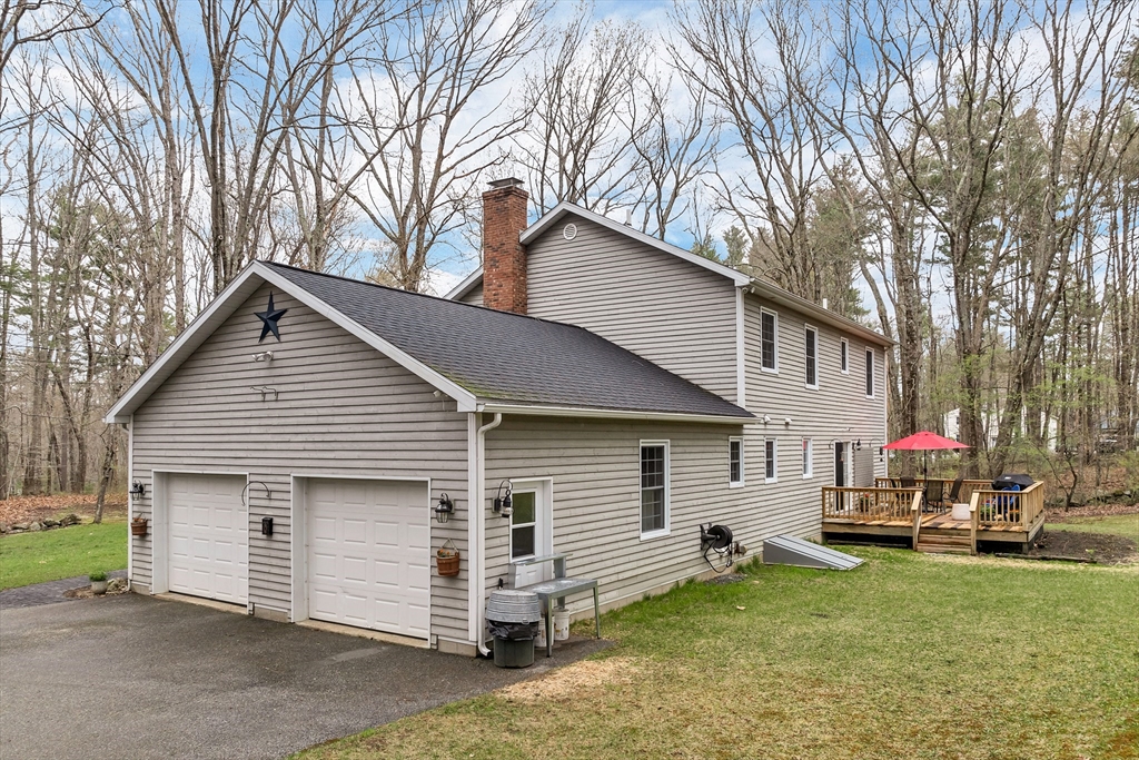 9 Juniper Ridge Road Exeter, NH 03833 - Photo 2 of 41 a view of a house with a patio