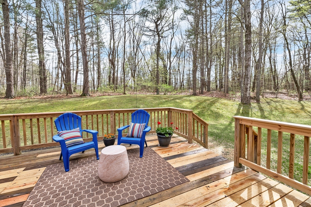 9 Juniper Ridge Road Exeter, NH 03833 - Photo 22 of 41 a sitting area with furniture and wooden floor