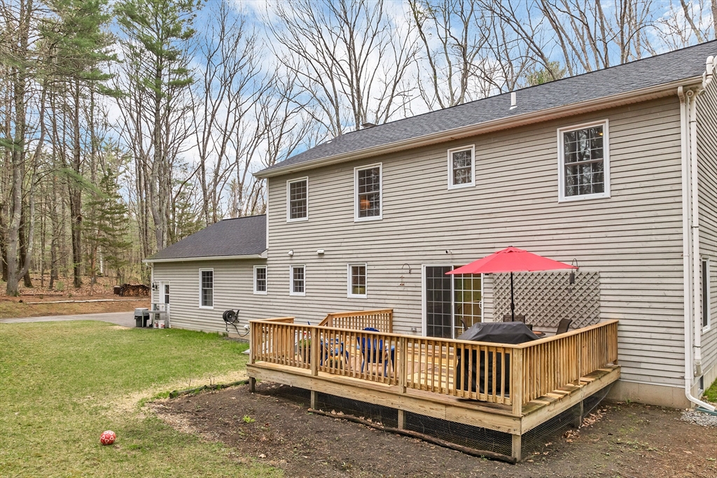 9 Juniper Ridge Road Exeter, NH 03833 - Photo 3 of 41 a view of backyard with deck and backyard