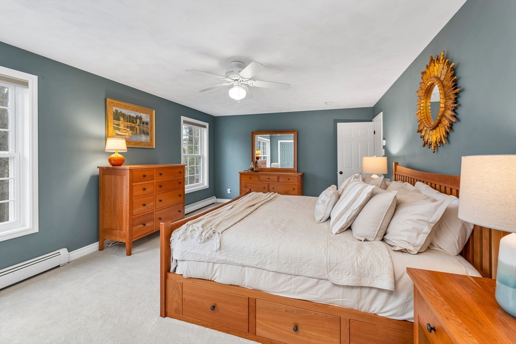 9 Juniper Ridge Road Exeter, NH 03833 - Photo 32 of 41 a bedroom with bed and window