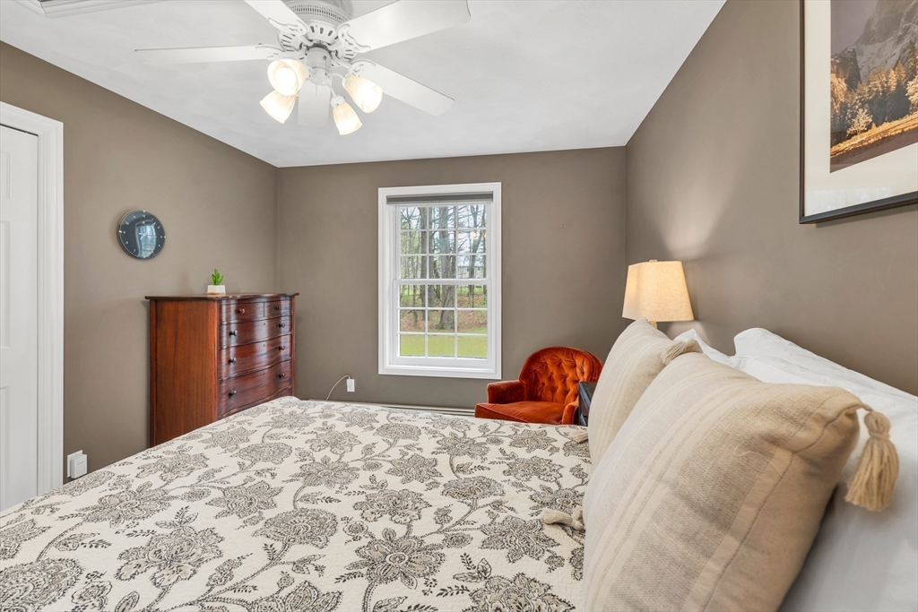 9 Juniper Ridge Road Exeter, NH 03833 - Photo 34 of 41 a bedroom with a bed and window