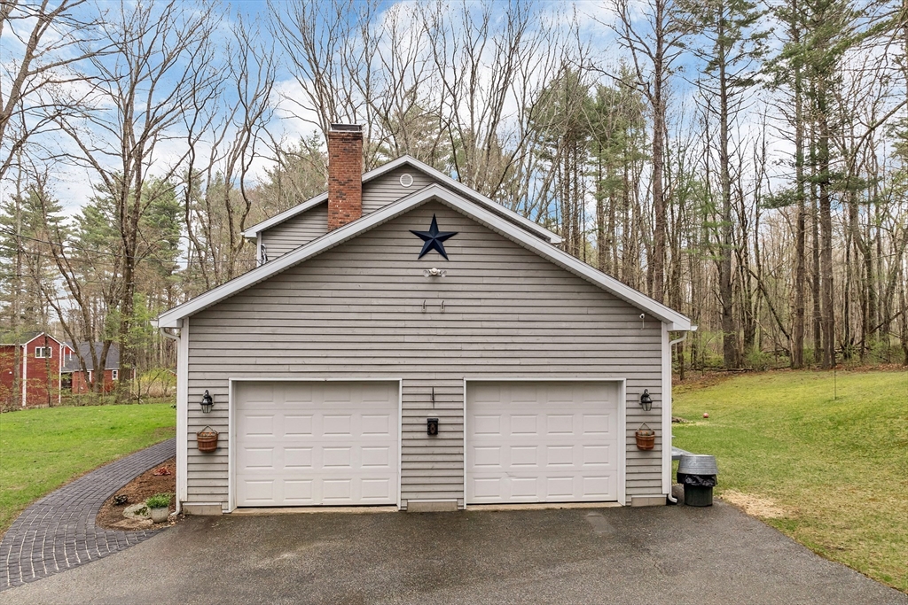 9 Juniper Ridge Road Exeter, NH 03833 - Photo 41 of 41 a view of backyard of house and garage