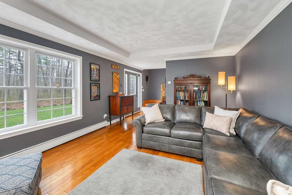 9 Juniper Ridge Road Exeter, NH 03833 - Photo 6 of 41 a living room with furniture and a large window