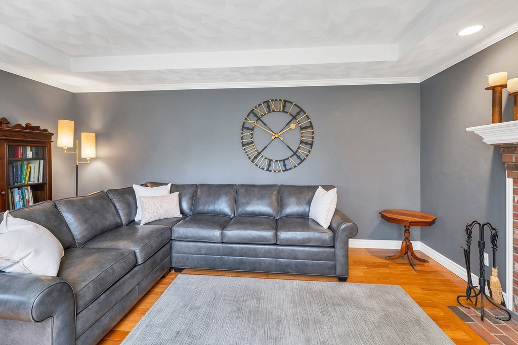 9 Juniper Ridge Road Exeter, NH 03833 - Photo 7 of 41 a living room with furniture and a rug