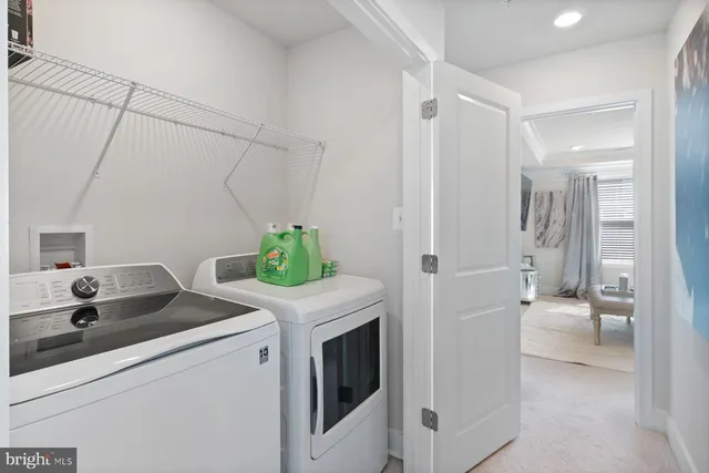 a kitchen with a sink and refrigerator