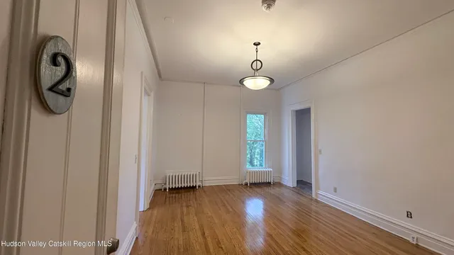 an empty room with window