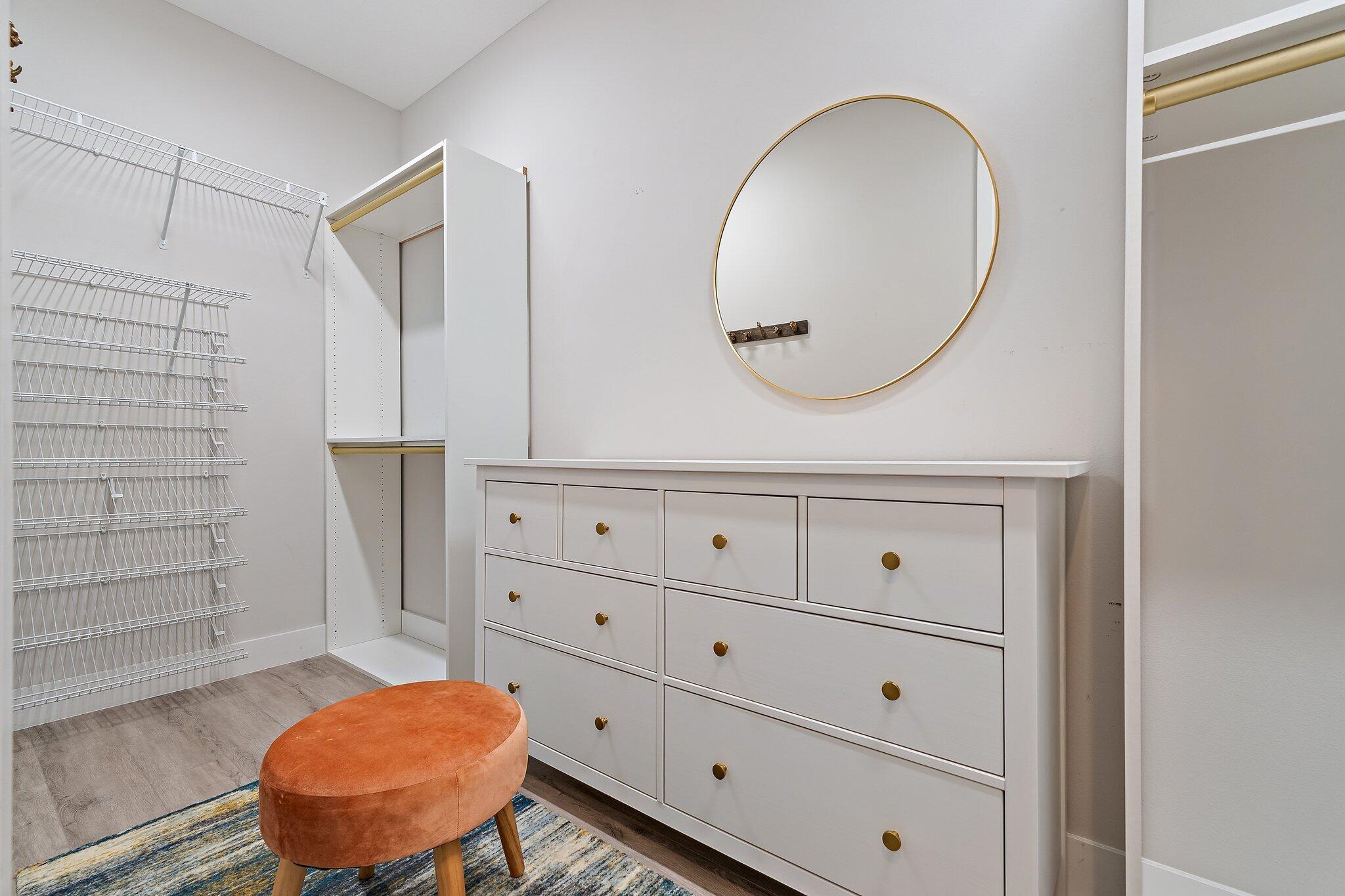 12216 175th Road North Jupiter, FL 33478 - Photo 30 of 57 a bathroom with a toilet a sink and mirror