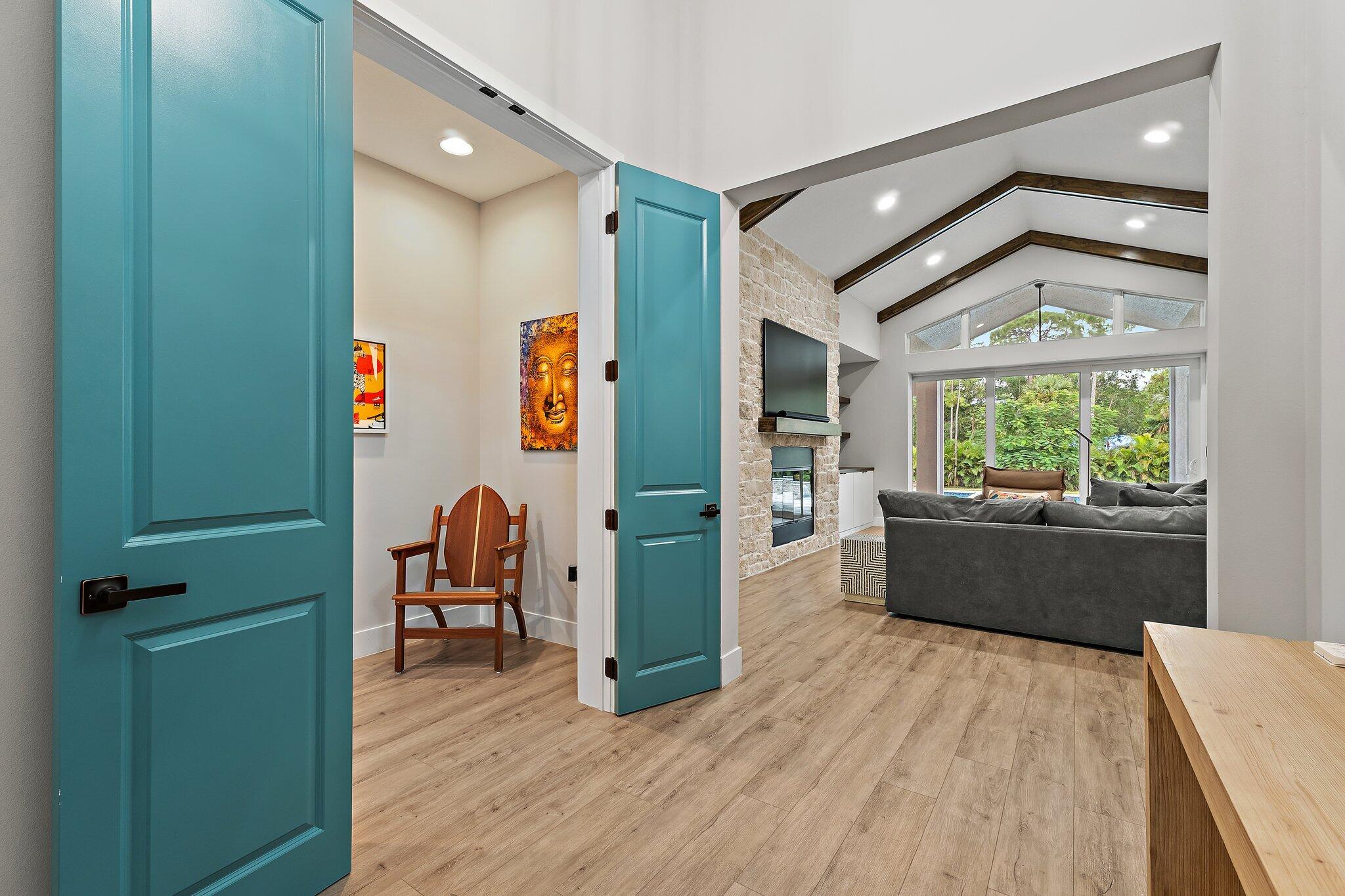 12216 175th Road North Jupiter, FL 33478 - Photo 10 of 57 a living room with furniture and a large window
