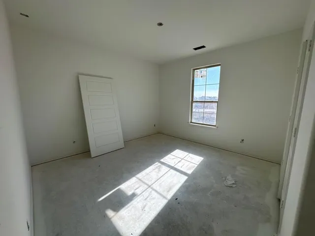 an empty room with windows