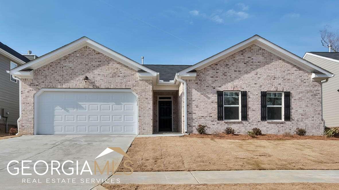 5363 Flat Rock Point Lithonia, GA 30038 - Photo 1 of 1 a view of a house with yard