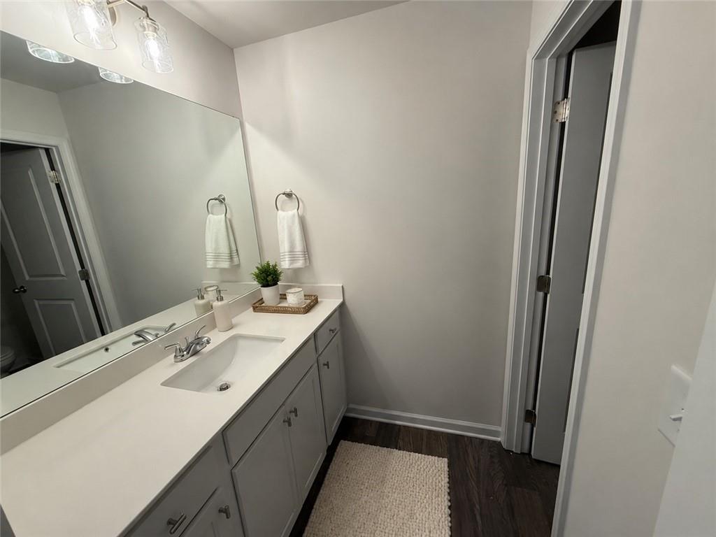 5151 Longview Run Decatur, GA 30035 - Photo 16 of 24 a bathroom with a sink and a mirror