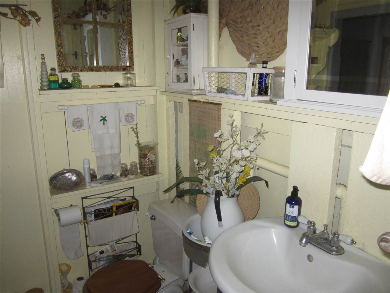 1085 West Kuiaha Road Haiku, HI 96708 - Photo 13 of 23 a bathroom with double vanity and a mirror