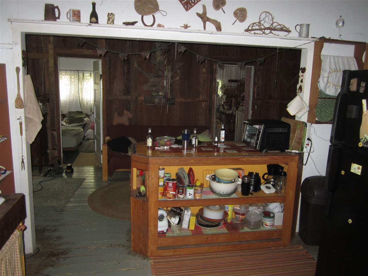 1085 West Kuiaha Road Haiku, HI 96708 - Photo 17 of 23 a view of living room with furniture and wooden floor
