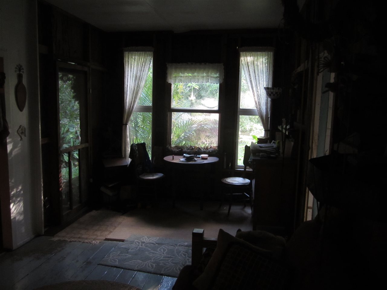 1085 West Kuiaha Road Haiku, HI 96708 - Photo 23 of 23 a living room with furniture and a floor to ceiling window