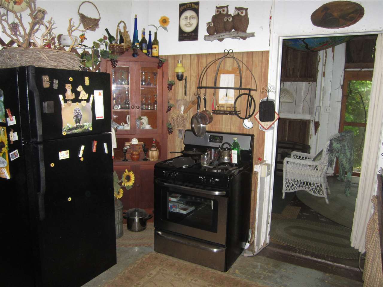 1085 West Kuiaha Road Haiku, HI 96708 - Photo 9 of 23 a view of a entryway door of the house and living room