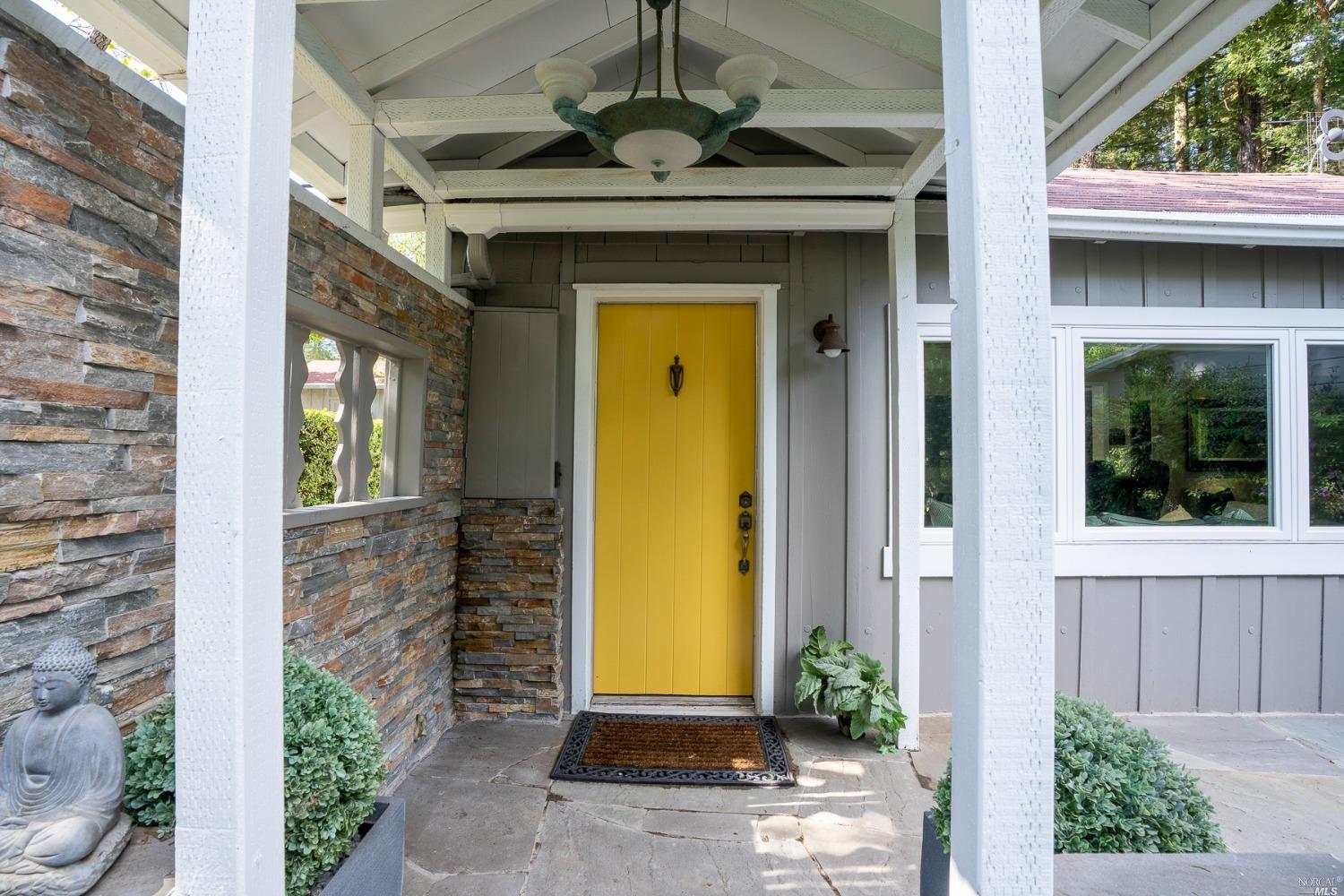 a front view of a house with a porch