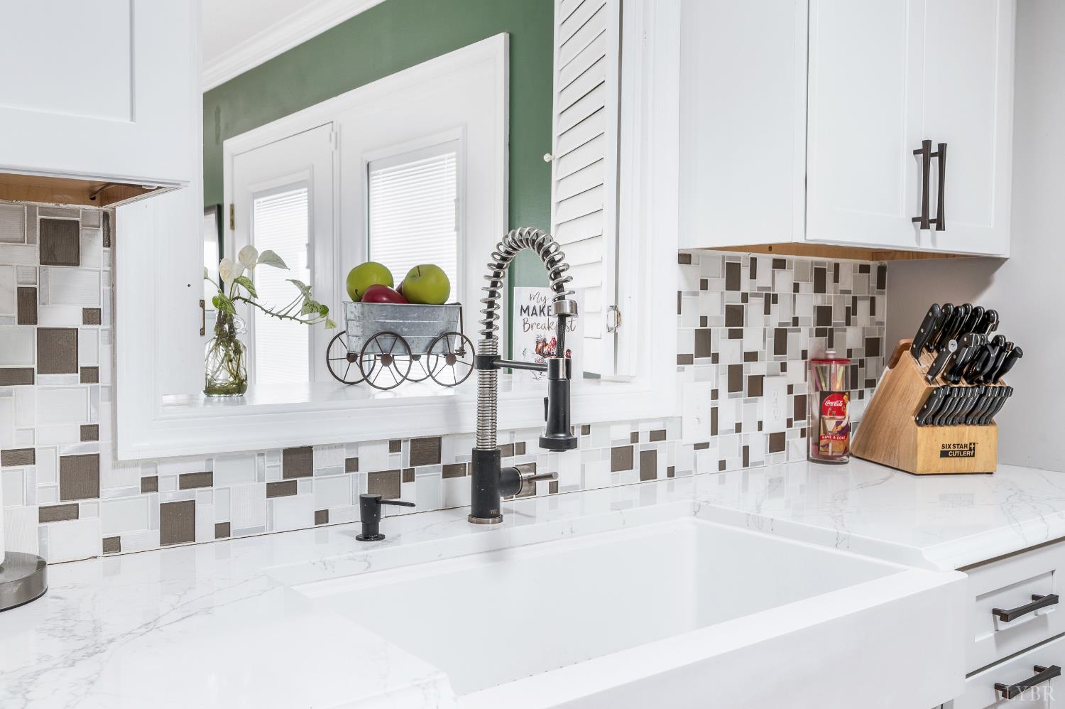 192 Liberty Chapel Road Appomattox, VA 24522 - Photo 15 of 60 a bathroom with a sink and a mirror
