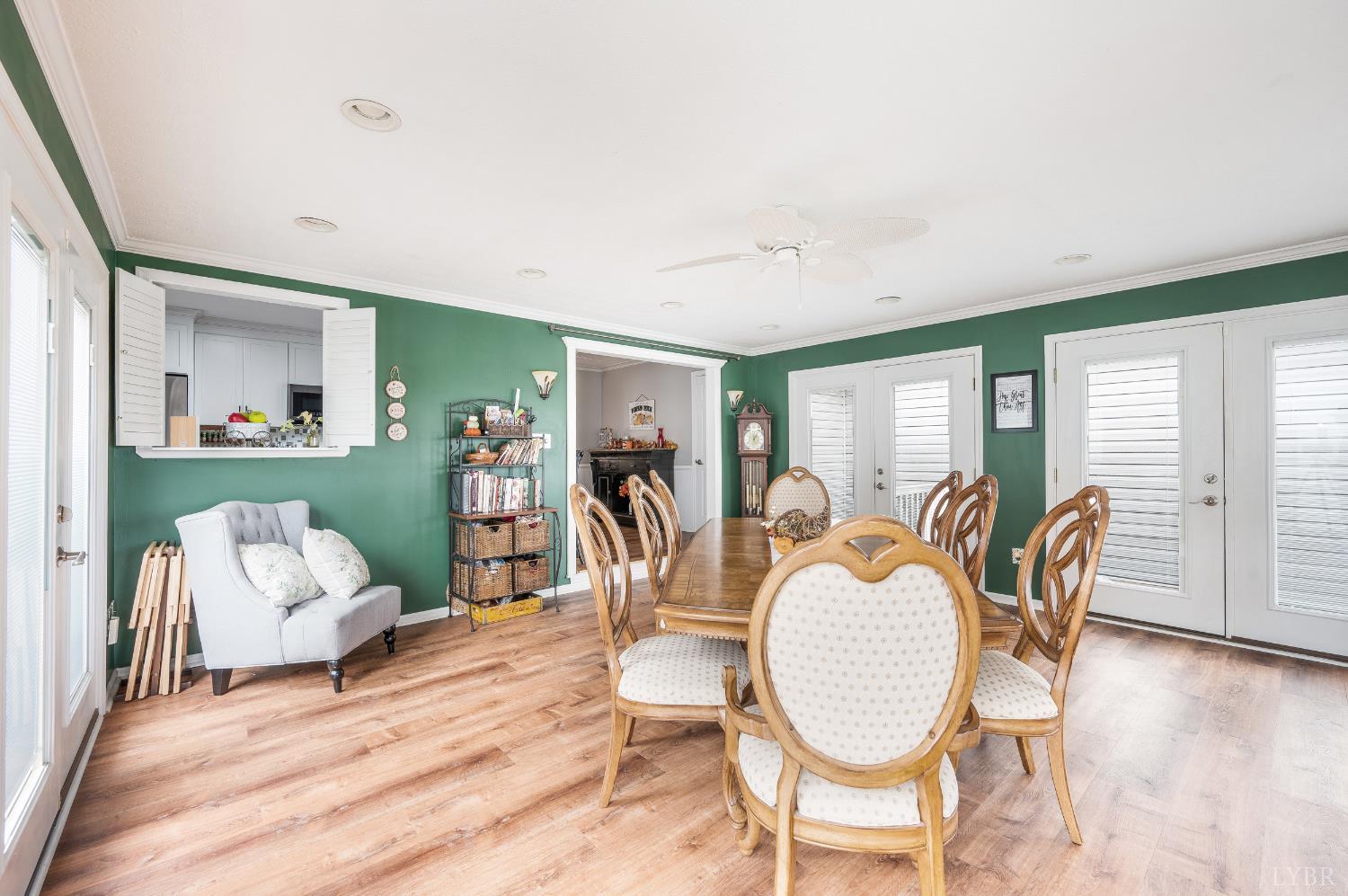 192 Liberty Chapel Road Appomattox, VA 24522 - Photo 19 of 60 a living room with furniture a dining table and wooden floor