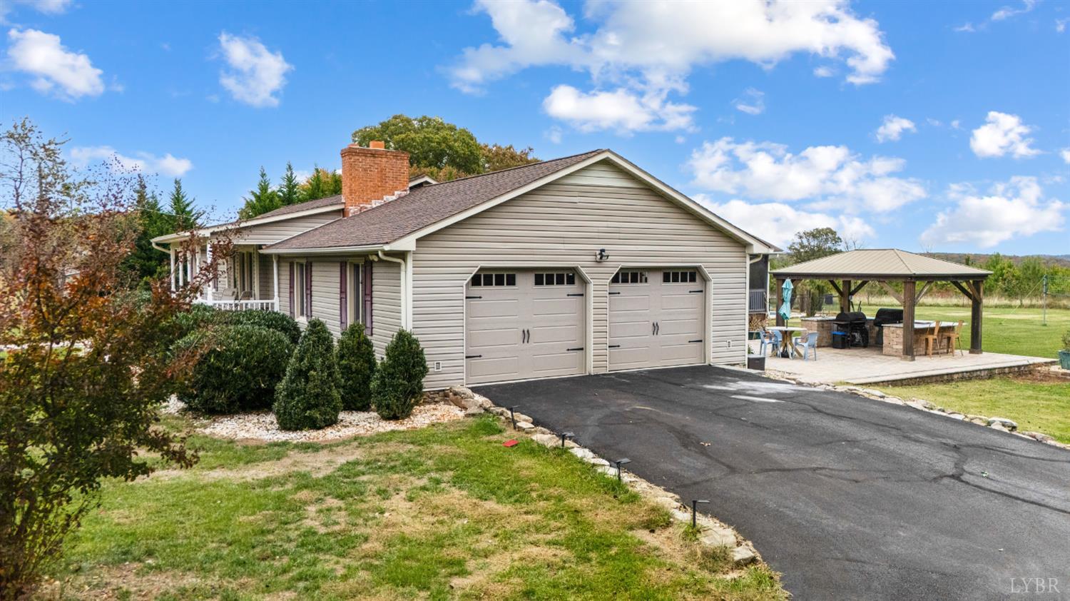 192 Liberty Chapel Road Appomattox, VA 24522 - Photo 2 of 60 a front view of a house with a yard