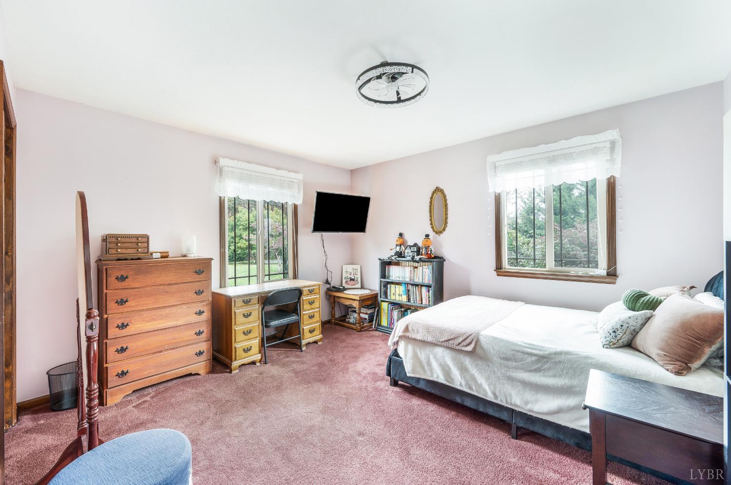 192 Liberty Chapel Road Appomattox, VA 24522 - Photo 25 of 60 a bedroom with a bed and a window