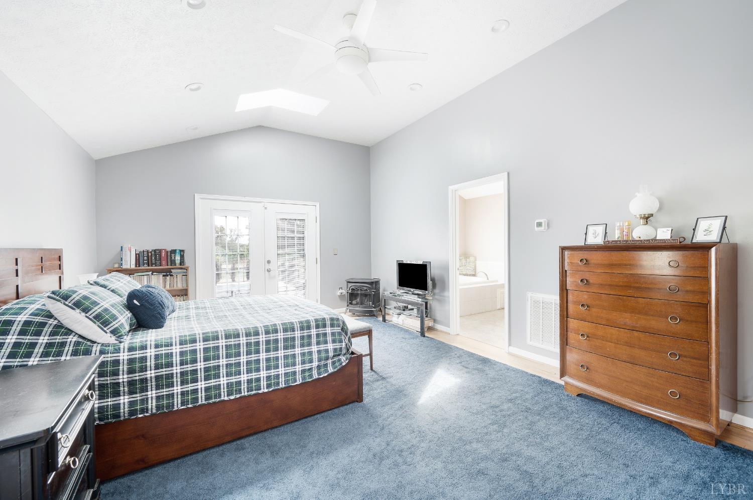 192 Liberty Chapel Road Appomattox, VA 24522 - Photo 28 of 60 a bedroom with a bed and walk in closet with window