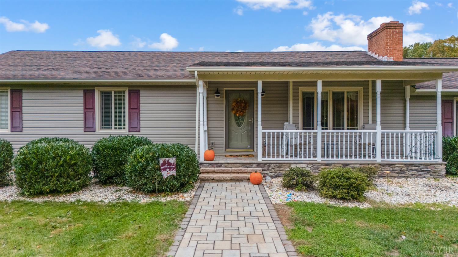 192 Liberty Chapel Road Appomattox, VA 24522 - Photo 3 of 60 a front view of a house with a yard