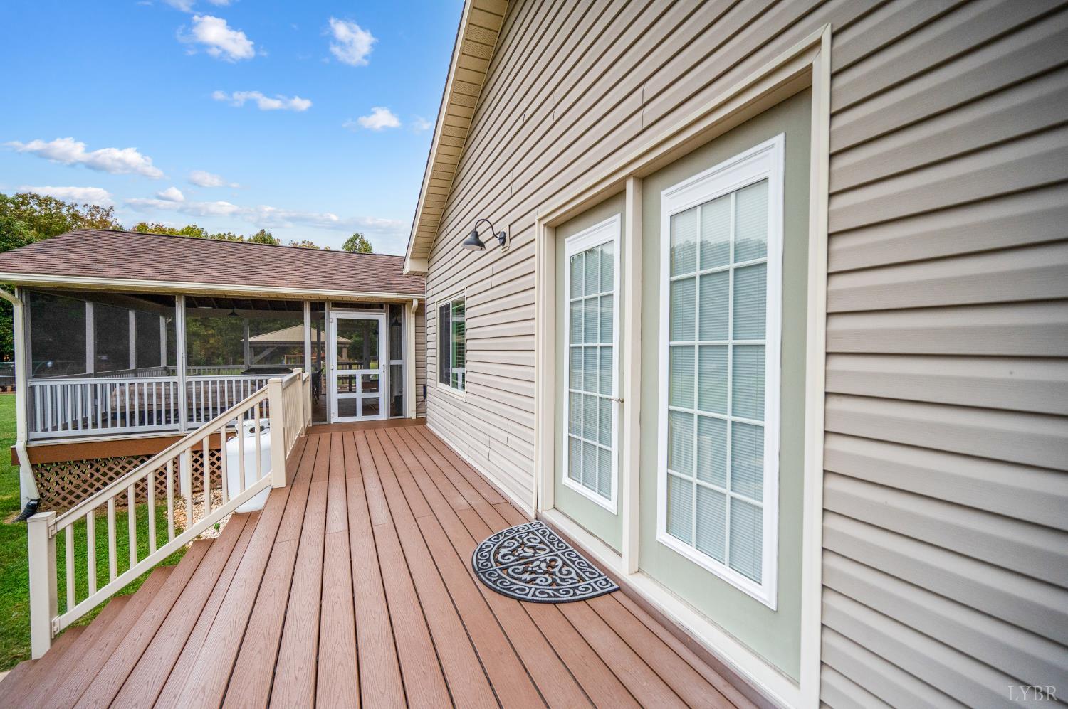 192 Liberty Chapel Road Appomattox, VA 24522 - Photo 47 of 60 a view of a house with wooden deck