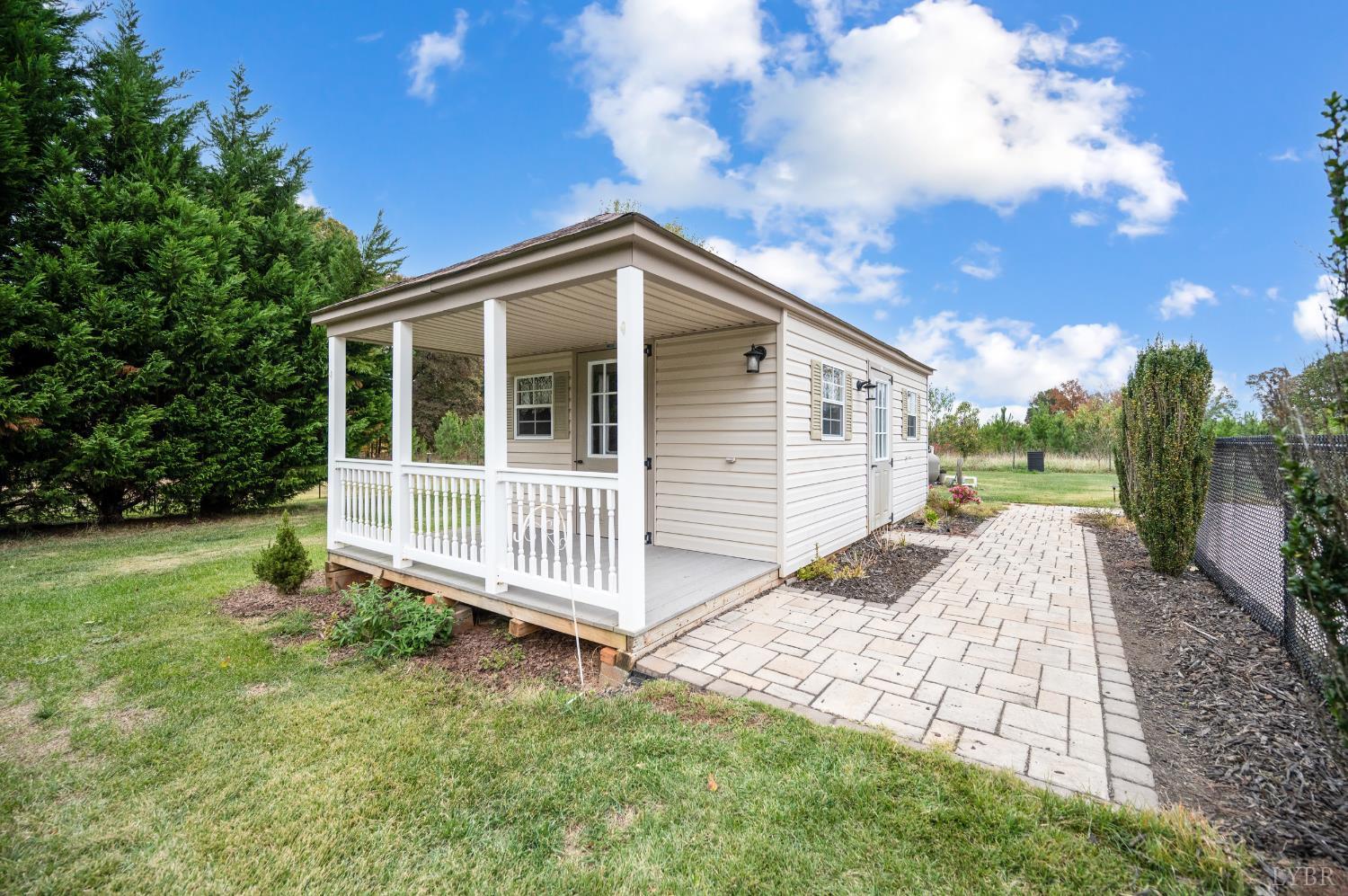 192 Liberty Chapel Road Appomattox, VA 24522 - Photo 48 of 60 a view of a house with a yard