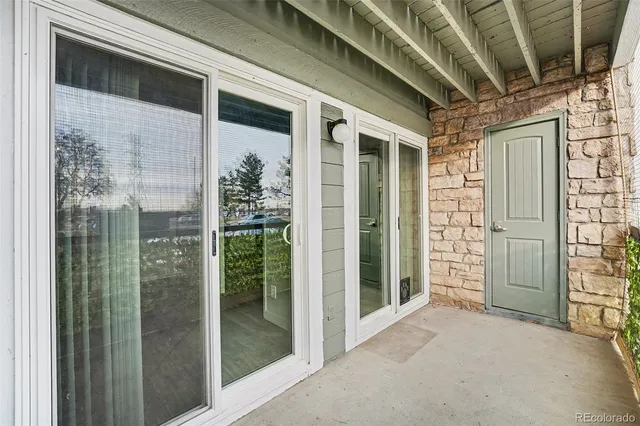 a view of a porch of a house