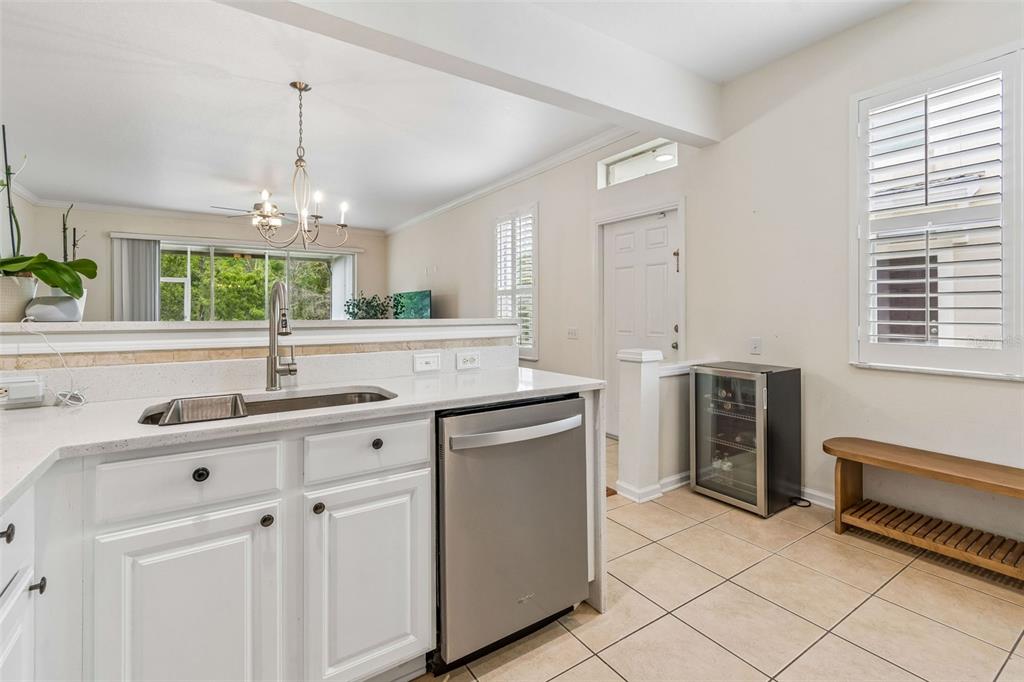 26527 Castleview Way Wesley Chapel, FL 33544 - Photo 12 of 45 a kitchen with a sink stove and cabinets