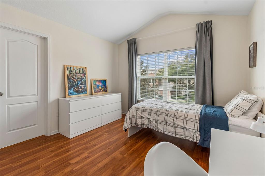 26527 Castleview Way Wesley Chapel, FL 33544 - Photo 23 of 45 a room with a bed and a window