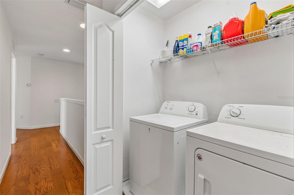 26527 Castleview Way Wesley Chapel, FL 33544 - Photo 30 of 45 a utility room with dryer and washer