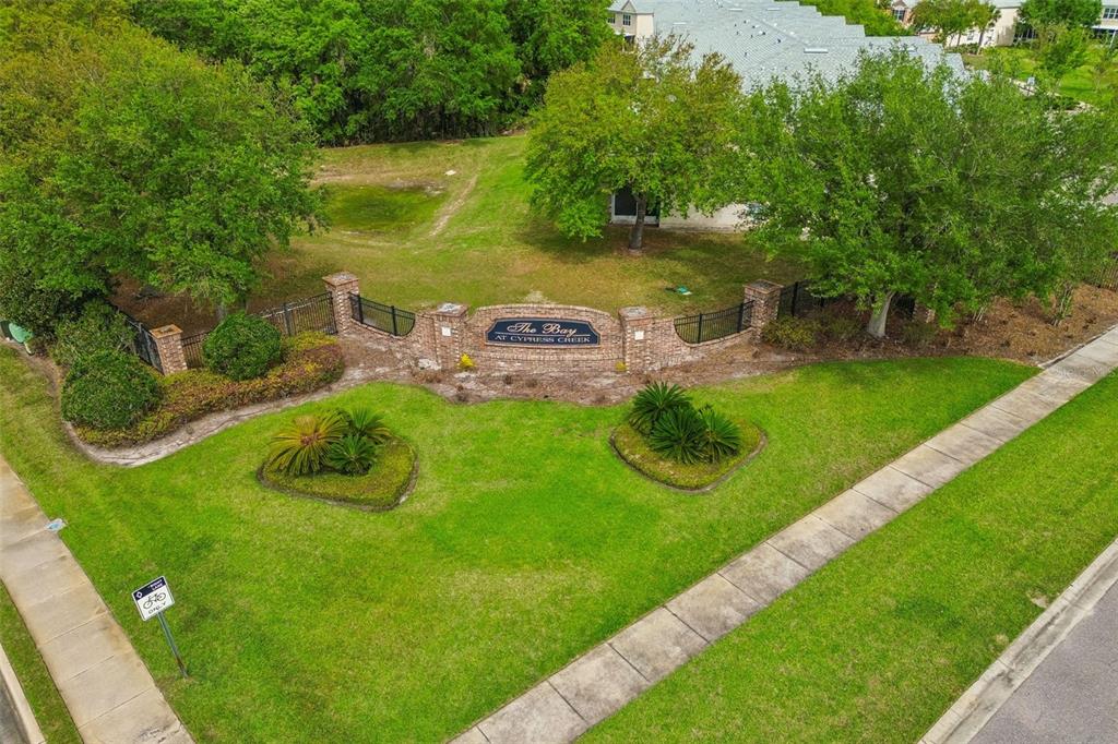 26527 Castleview Way Wesley Chapel, FL 33544 - Photo 31 of 45 a view of a lake with a yard