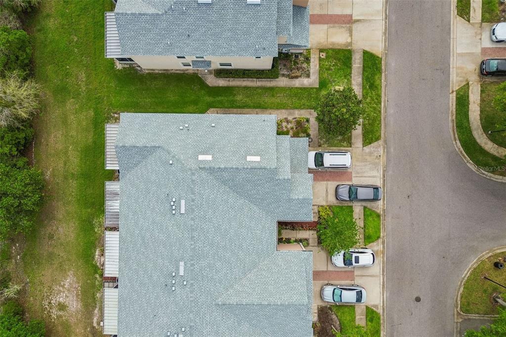 26527 Castleview Way Wesley Chapel, FL 33544 - Photo 33 of 45 an aerial view of a house with a swimming pool