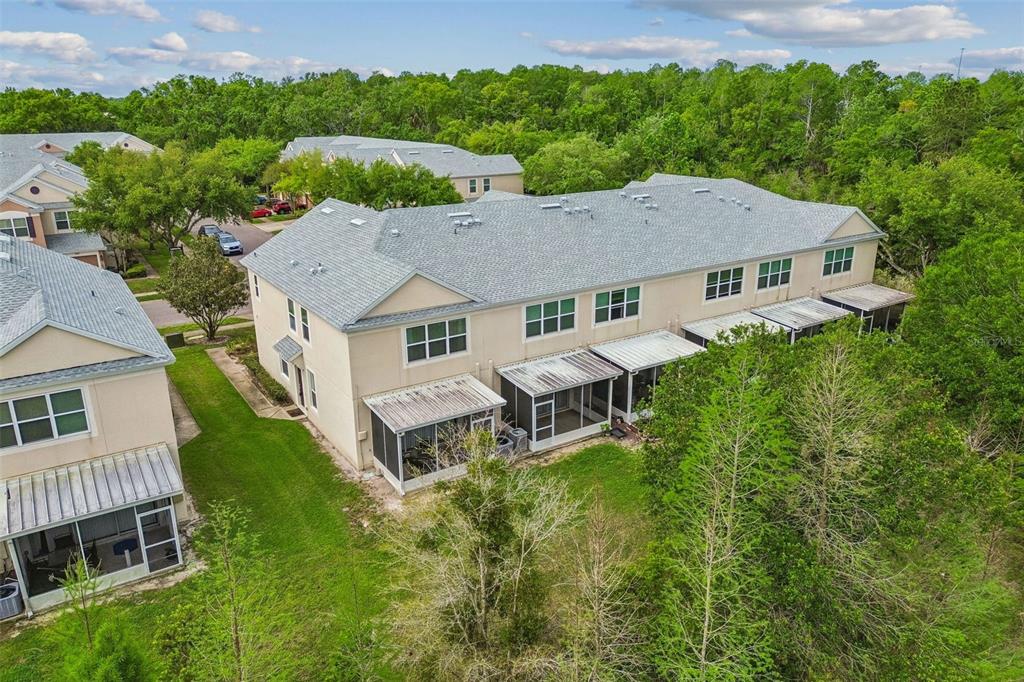 26527 Castleview Way Wesley Chapel, FL 33544 - Photo 36 of 45 an aerial view of a house with yard porch and furniture