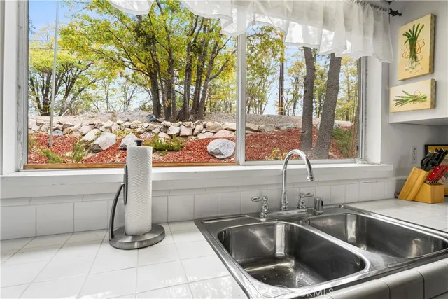 a bedroom with a bed and a table in it